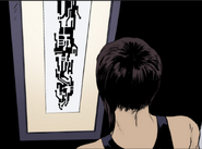 Faith looks upon her mother’s artwork.