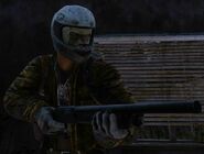 A player holding the AT-12 Shotgun.