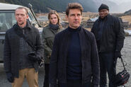 Luther with Hunt, Benji and Ilsa in Mission Impossible: Fallout.