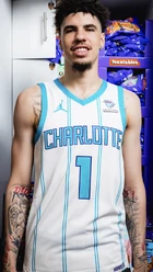 Charlotte Hornets Player Lamelo Ball Wearing Feastables Patch on The Jersey