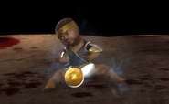 Baby Cyrax (human) playing with one of his bombs