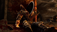 Baraka having been killed by Kung Lao, with Sub-Zero's corpse in the distance, having Baraka's arm blade on his back.