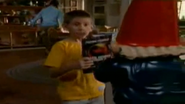 Dewey holds a magazine with the MK logo in "Malcolm in the Middle."