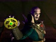 Quan Chi showing the real Amulet of Shinnok in his MK4 ending