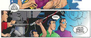 Dan Forden (Holding the mic) as he appears in the official MKII comic.