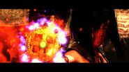 Mileena's hand beginning to burn from wielding the immense power of the amulet.