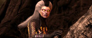 Sindel hides behind a stone