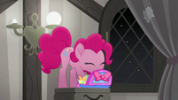 Pinkie Pie digging into her travel bag MLPRR
