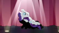 Rarity singing under a spotlight S7E14