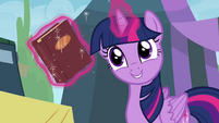 Twilight with book she got the day she met Pinkie S4E22