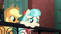 Applejack approaches Coco on the balcony S5E16