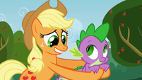 Applejack holding Spike S3E8