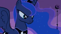 Princess Luna frowns at a citizen of Ponyville.