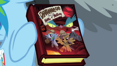 Rainbow Dash holding Daring Do book S04E04