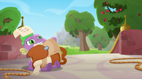 Spike with Twilight's bag on top of him MLPRR