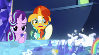 Starlight and Sunburst look at Sire's Hollow on the map S8E8