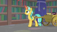 Unicorn student restacking the bookshelves S8E11