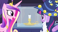 Cadance and Twilight looking at a candlestick S4E11