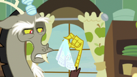 Discord holding handkerchief with disgust S8E10