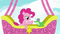 Pinkie Pie waves her hoof in Gummy's face S7E11