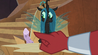 Tirek pointing at Chrysalis' log of wood S9E8