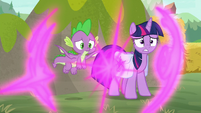 Twilight and Spike teleport behind a rock S9E5
