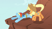 Applejack keeps her hat well in the vortex.