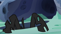 Changeling climbing out of a hive hole S6E26