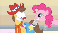 Pinkie Pie shows Applejack's picture to Caramel S1E14