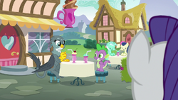 Rarity looking at Spike and Gabby hanging out at Ponyville Cafe S9E19