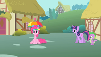 Twilight Sparkle walking up to Pinkie.