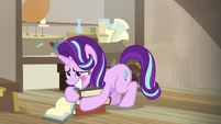 Starlight Glimmer hugging a pile of books S7E24.png (855 KB)