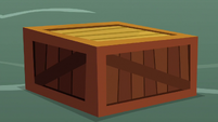 Wooden crate is placed on the ground S9E25