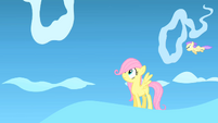 Fluttershy looks at the cloud ring she has to cross S1E23