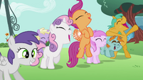 Scootaloo flapping her little wings.