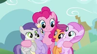Pinkie Pie sharing the love with these fillies