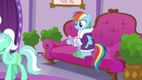 Rainbow Dash reading on a spa couch S6E10
