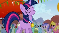 Proud unicorn with her medal.