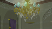 A webbed chandelier S6E9