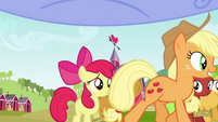 Applejack walking past Apple Bloom and Babs S3E08