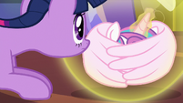 Twilight looks at curled-up Flurry Heart S7E3