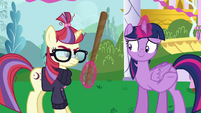 Twilight offering a pinata stick to Moon Dancer S5E12