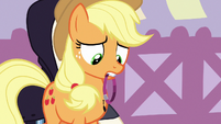 Applejack looking at purple band in her mouth S7E9