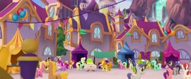 Ponies mingle in the Canterlot plaza MLPTM