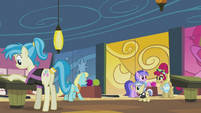Several ponies at the bowling center S5E9