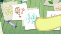 Apple Bloom grabs one of the drawings S6E4