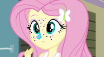 Fluttershy covered in frosting and glitter EG2