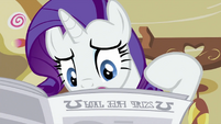 Rarity reading newspaper closely S2E23