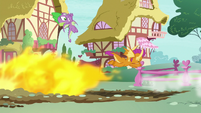 Spike and Smolder avoid the giant fireball S8E24