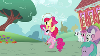Apple Bloom gets lifted by Pinkie.